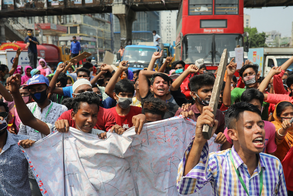 Garment workers block a road demanding their due wages during the lockdown amid concerns over the coronavirus disease (COVID-19) outbreak in Dhaka, Bangladesh, April 13, 2020. u00e2u20acu201d Reuters pic