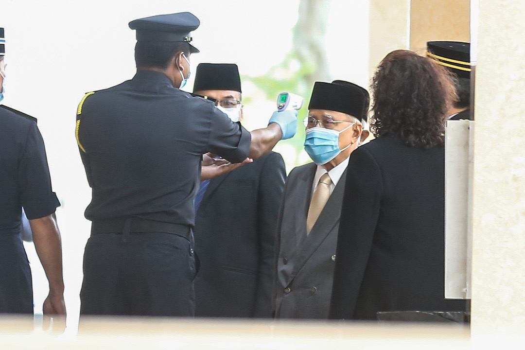 Yang DiPertua Pulau Pinang Tun Abdul Rahman Abbas has his temperature screened before entering the Dewan Sri Pinang for the first sitting of 14th State Assembly Session in George Town April 14, 2020. u00e2u20acu201d Picture by Sayuti Zainudin