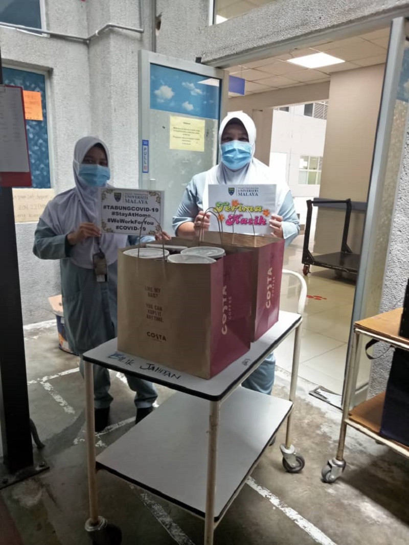 Costa Coffee employees distribute food to frontliners at the Sungai Buloh Hospital. — Picture courtesy of Costa Coffee Malaysia