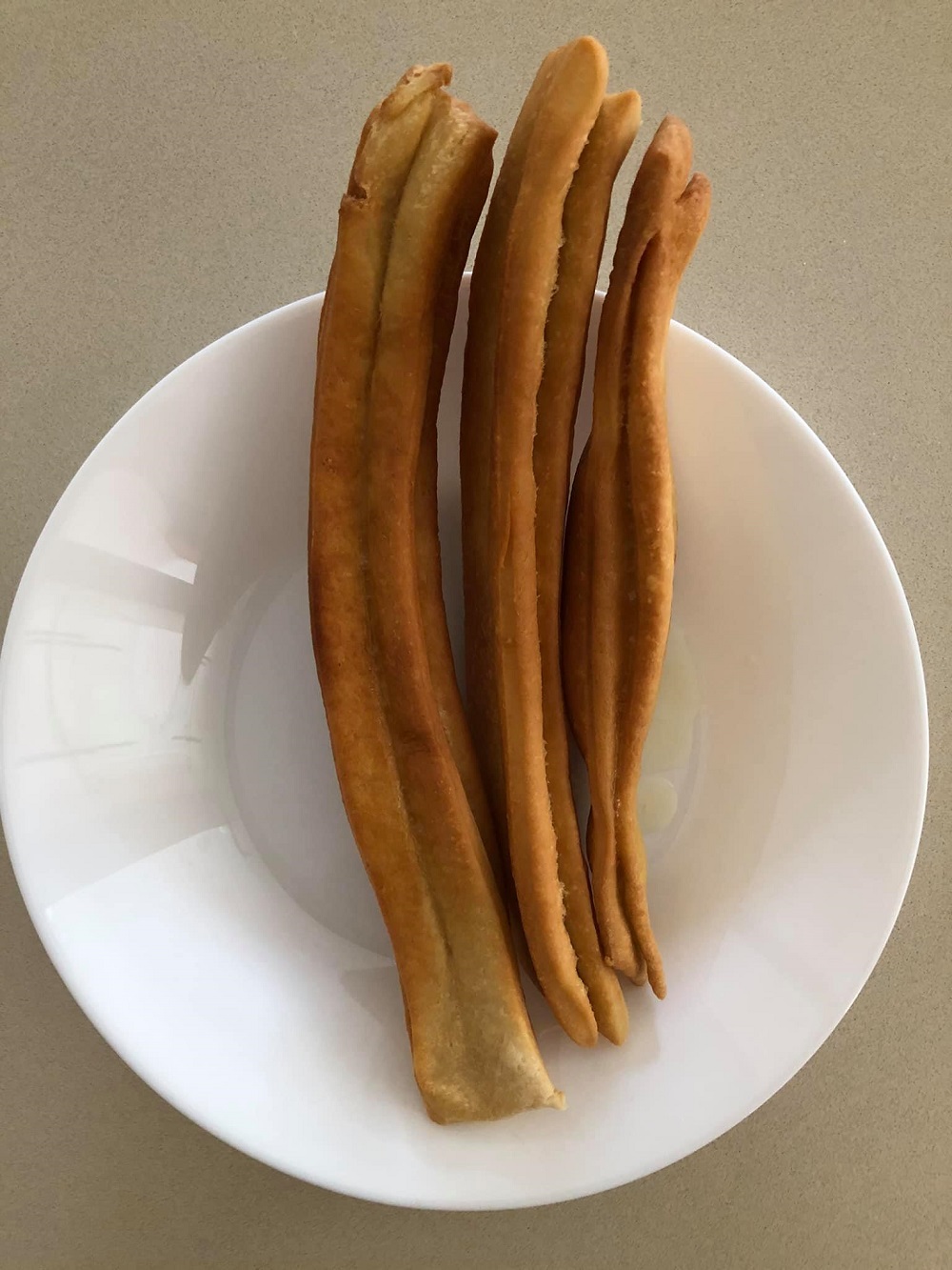 An unusually long cakoi stick made by Anne Khan. — Picture via Facebook/Anne Khan