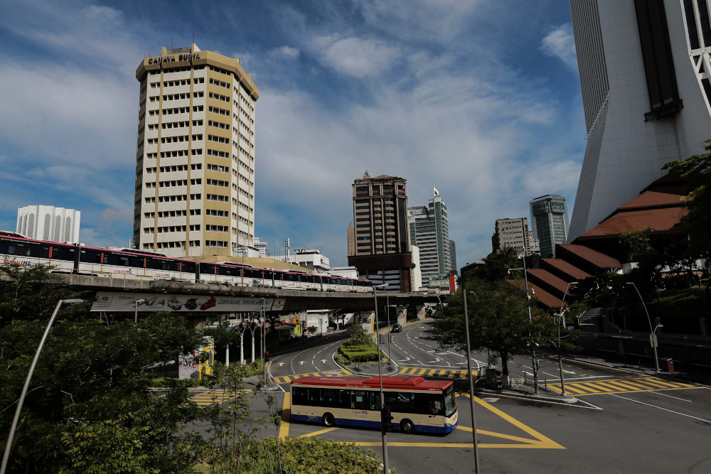 A RapidKL bus is pictured on a deserted road during movement control order in Kuala Lumpur April 24, 2020. u00e2u20acu201d Picture by Ahmad Zamzahuri