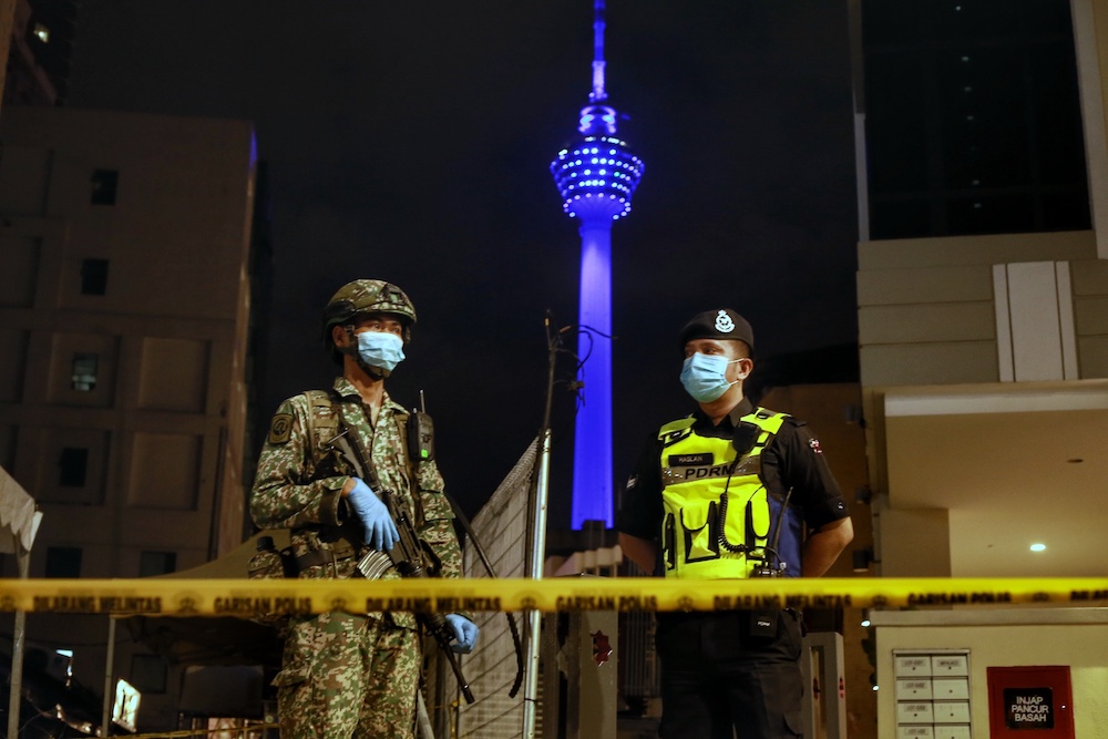 The KL Tower is illuminated in blue in a show of solidarity for frontliners battling the Covid-19 outbreak, April 30,2020. u00e2u20acu201d Picture by Ahmad Zamzahuri 