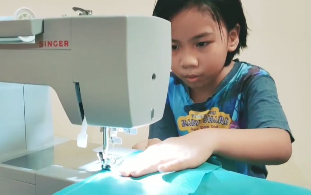 The Standard Three student has been busy sewing protective gear for medical frontliners. u00e2u20acu201d Screengrab from Instagram/hasnahhud