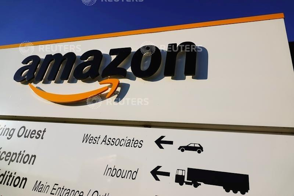 The logo of Amazon is seen at the company logistics center in Lauwin-Planque, northern France, December 30, 2019. Picture taken December 30, 2019. u00e2u20acu201d Reuters picnn