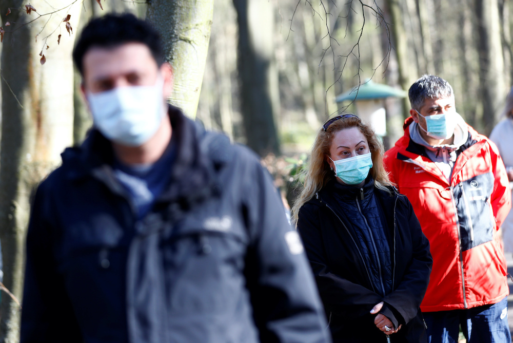 People queue outside a test centre for coronavirus disease (Covid-19) at Havelhoehe community hospital in Berlin, Germany, April 6, 2020. u00e2u20acu2022 Reuters picnn