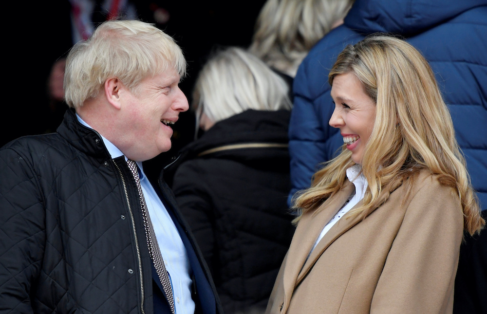 Britain's Prime Minister Boris Johnson with his partner Carrie Symonds before the Six Nations Championship match between England and Wales at the Twickenham Stadium, London, Britain, March 7, 2020. u00e2u20acu201d Reuters pic