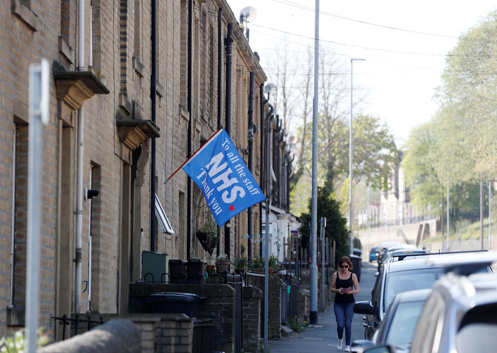 A flag supporting the NHS is seen outside of a house in Sowerby Bridge, as the spread of the coronavirus disease (Covid-19) continues, Sowerby Bridge, Britain, April 16, 2020. u00e2u20acu2022 Reuters  pic