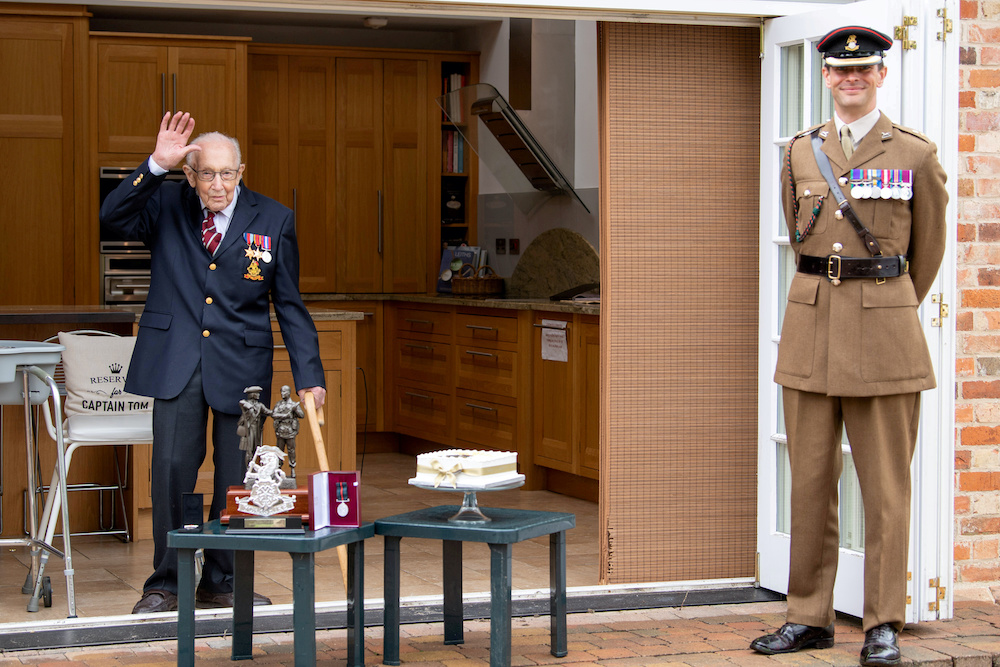 Former British Army Officer Captain Tom Moore, appointed the first Honorary Colonel of the Army Foundation College in Harrogate, stands with Lieutenant Colonel Thomas Miller next to his medals and gifts in Bedford, Britain April 29, 2020. u00e2u20acu201c Reuters pic