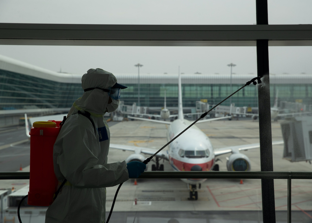 A firefighter in protective suit disinfects Wuhan Tianhe International Airport before the airport resumes its domestic flights on April 8, in Wuhan, Hubei province, the epicentre of China’s novel coronavirus disease (Covid-19) outbreak, April 3, 2020. C