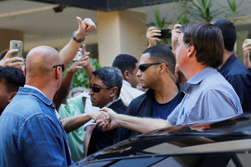 Brazil's President Jair Bolsonaro greets supporters in a neighbourhood Sudoeste, amid the coronavirus disease outbreak, in Brasilia, Brazil April 10, 2020. u00e2u20acu2022 Reuters pic