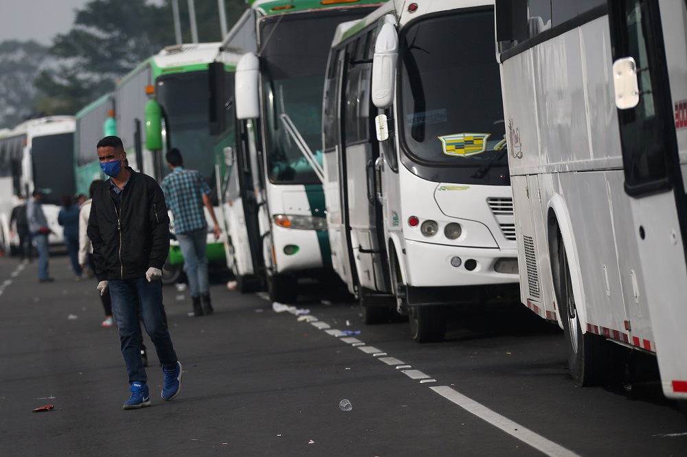 A Venezuelan migrant wearing a face mask participates in a protest against the blockade of buses that migrants hired to reach the Colombian-Venezuelan border, amid the outbreak of the coronavirus disease in Bogota, Colombia April 29, 2020. u00e2u20acu2022 Reuters pic