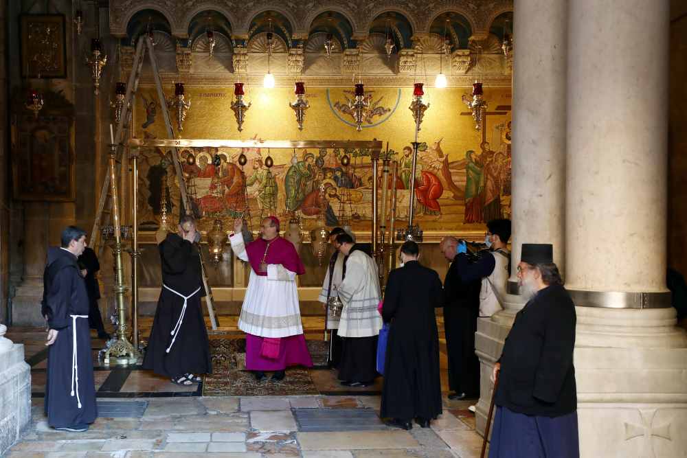 Archbishop Pierbattista Pizzaballa, apostolic administrator of the Latin Patriarchate of Jerusalem stands inside the Church of the Holy Sepulchre amid restrictions due to Covid-19 in Jerusalem's Old City April 9, 2020. u00e2u20acu2022 Reuters pic