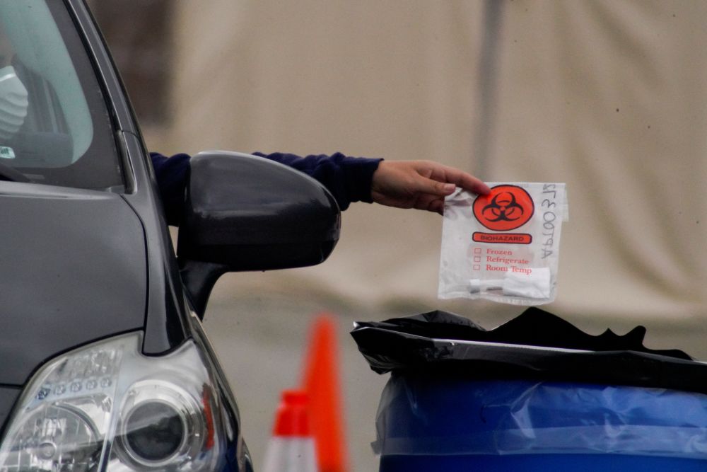 A Covid-19 test is dropped into a barrel at a testing location during the outbreak of the coronavirus disease in Los Angeles April 5, 2020. u00e2u20acu2022 Reuters pic