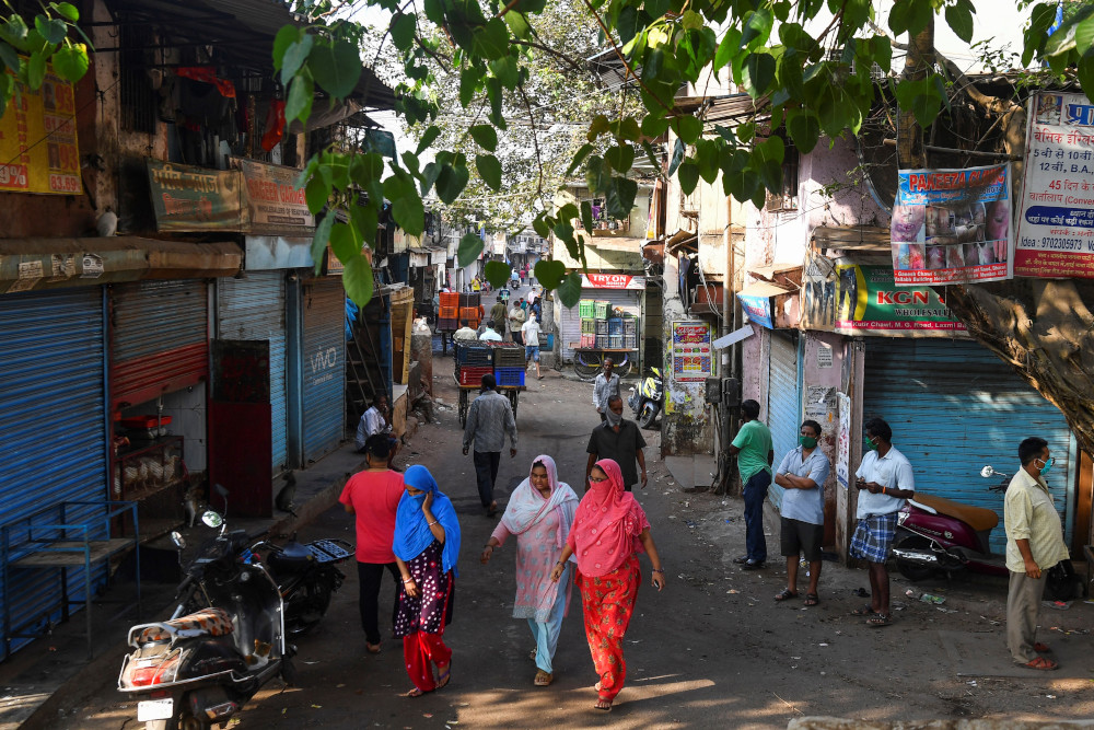 In this picture taken April 6, 2020, residents walk inside the Dharavi slums during a government-imposed nationwide lockdown as a preventive measure against the spread of the Covid-19 coronavirus in Mumbai. u00e2u20acu201d AFP pic 