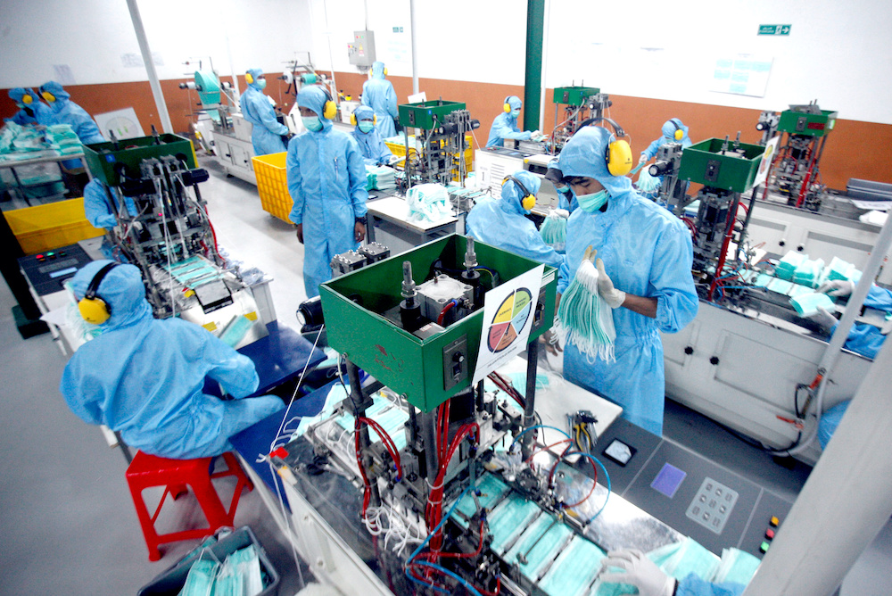 Employees make protective face masks at a factory, amid coronavirus disease (Covid-19) outbreak in Gunung Putri, Bogor, near Jakarta April 15, 2020 in this photo taken by Antara Foto. u00e2u20acu2022 Reuters pic