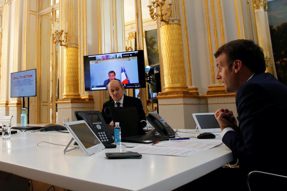 French President Emmanuel Macron speaks with Tedros Adhanom Ghebreyesus, Director General of the World Health Organization and other world leaders about the coronavirus outbreak during a video conference at the Elysee Palace in Paris, France, April 24, 20