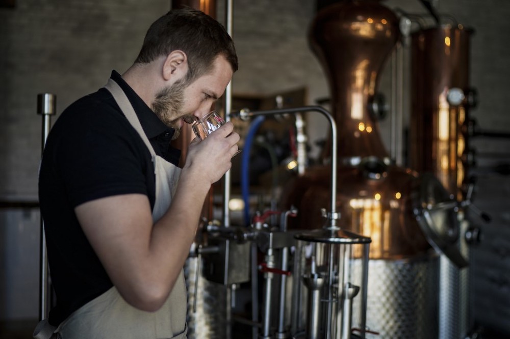 Manager of the Waterloo Microdistillery, Edward Martin, works on April 7, 2020, at the Mont-Saint-Jean Farm, in Waterloo. u00e2u20acu201d AFPnnn