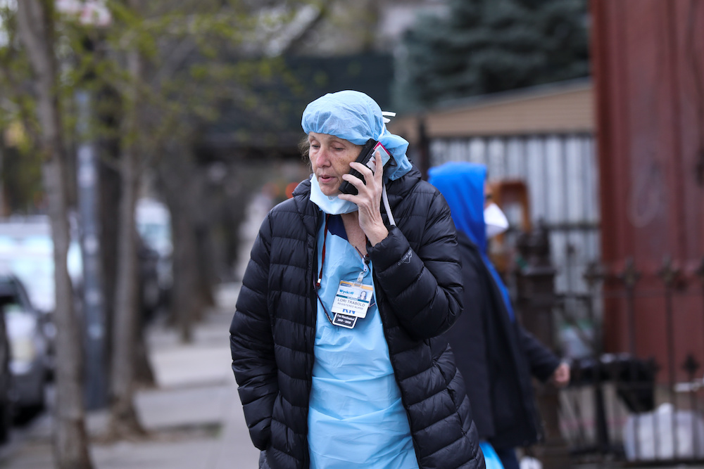 A nurse makes a phone call during a break outside the Wyckoff Heights Medical Center during the outbreak of the coronavirus disease (Covid-19) in the Brooklyn borough of New York City, New York, US, April 10, 2020. u00e2u20acu2022 Reuters picnn
