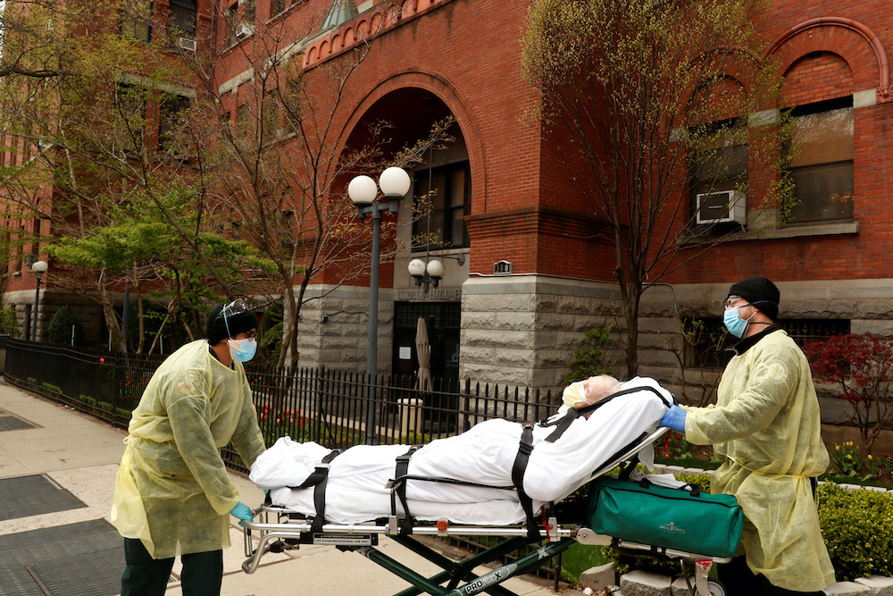 Emergency Medical Technicians wheel a man out of the Cobble Hill Health Centre nursing home during an ongoing outbreak of the coronavirus disease in the Brooklyn borough of New York, April 17, 2020. u00e2u20acu201d Reuters picnnn