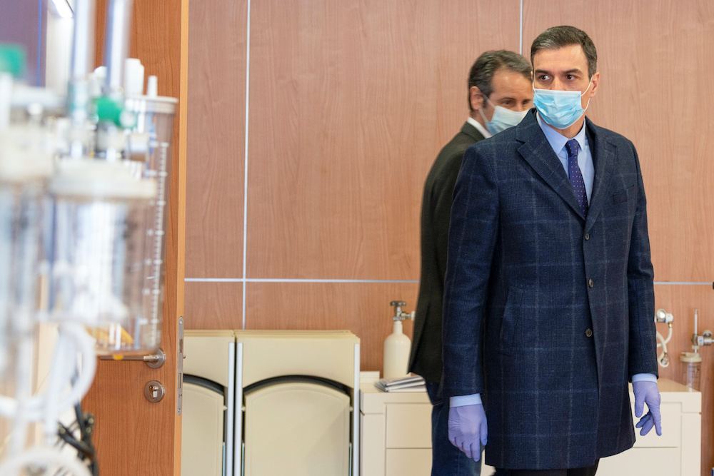 Spanish Prime Minister Pedro Sanchez wears a face mask and protective gloves as he visits a respirators factory amid the coronavirus disease (Covid-19) outbreak in Mostoles, Spain, April 3, 2020. u00e2u20acu201d Reuters picnnnn