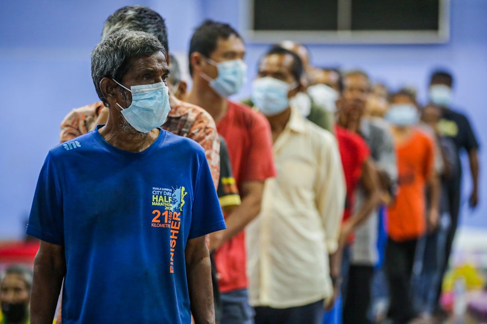 Homeless people find shelter at the Sentul Perdana Community Centre in Kuala Lumpur amid the movement control order April 2, 2020. u00e2u20acu201d Picture by Hari Anggara
