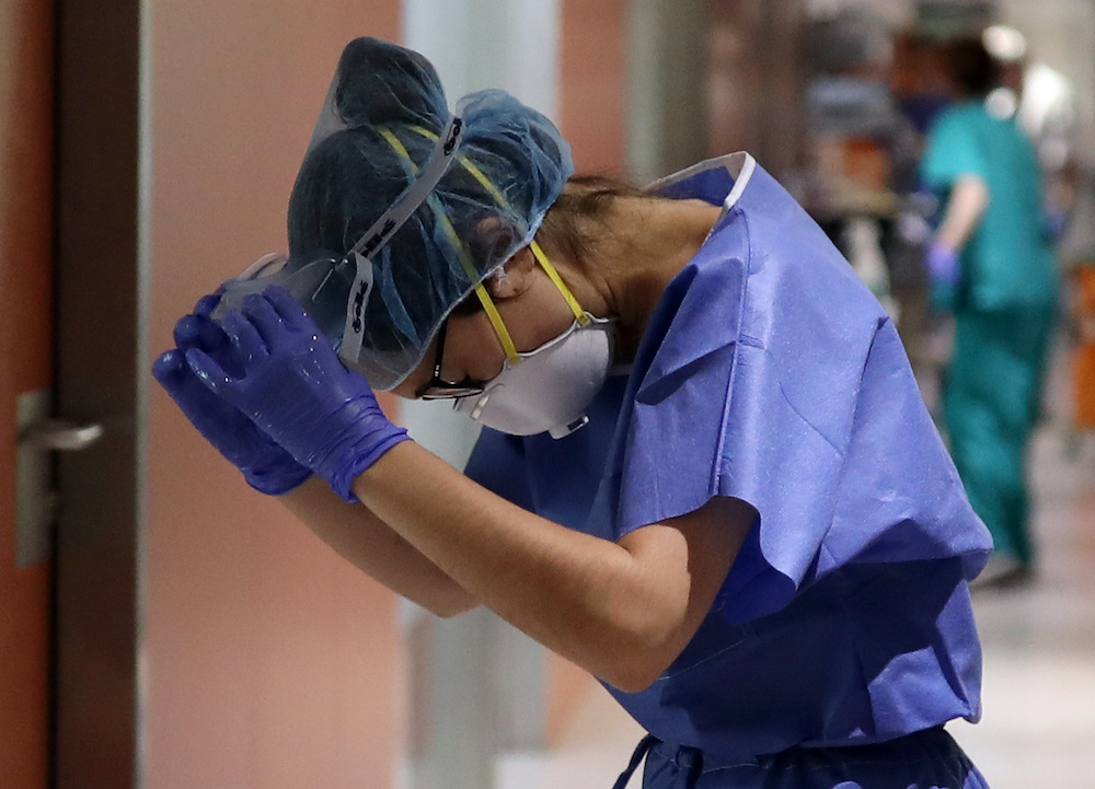 Hospital staff prepare to treat patients suffering from coronavirus disease in the Intensive Care Unit (ICU) at the Hospital Clinic in Barcelona, Spain, April 23, 2020. ― Reuters pic