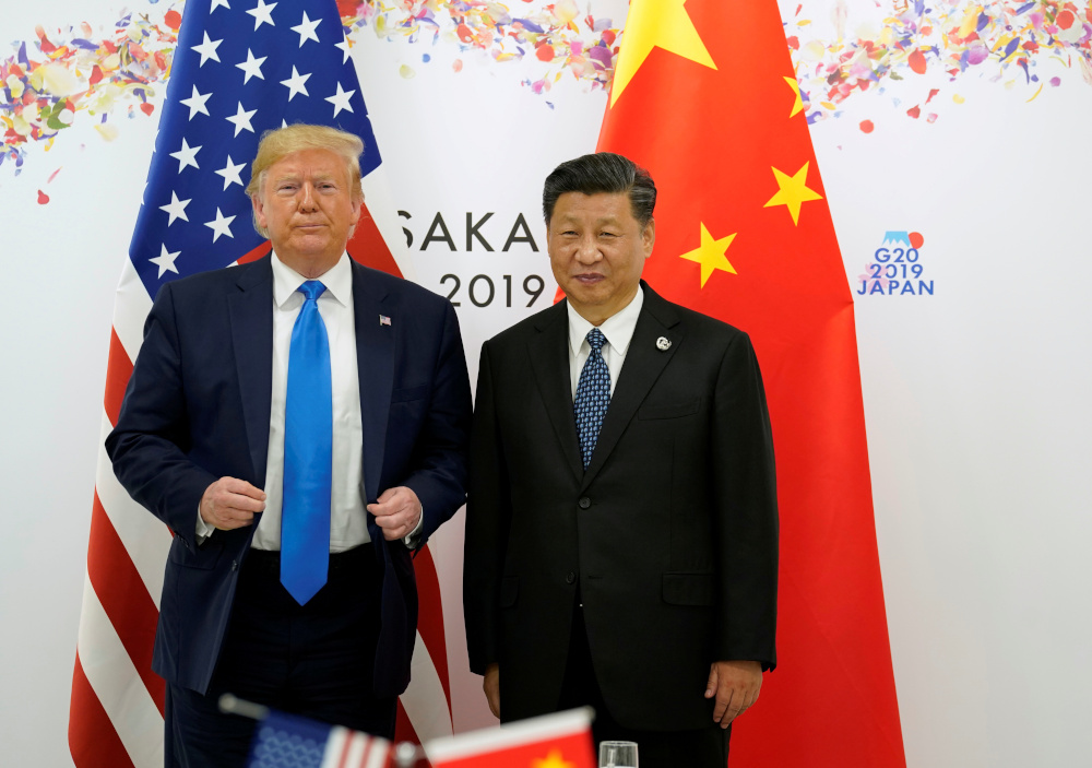 US President Donald Trump and Chinau00e2u20acu2122s President Xi Jinping pose for a photo ahead of their bilateral meeting during the G20 leaders summit in Osaka, Japan, June 29, 2019. u00e2u20acu201d Reuters pic 