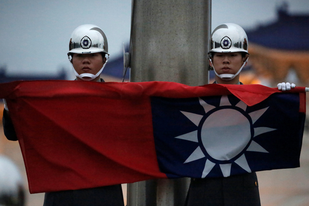 Honour guards perform Taiwan national flag lowering ceremony at Liberty Square, as the spread of the coronavirus disease (Covid-19) continues, in Taipei, Taiwan, April 1, 2020. u00e2u20acu201d Reuters pic
