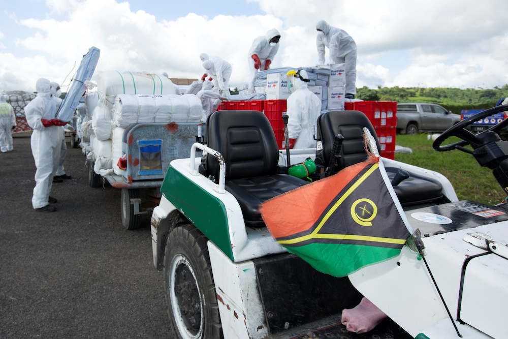 Airport staff and Royal Australian Air Force personnel load boxes of humanitarian aid transported by a Royal Australian Air Force C-17A Globemaster III to Port Vila airport, following Cyclone Harold, in Vanuatu April 13, 2020. u00e2u20acu201d Reuters pic