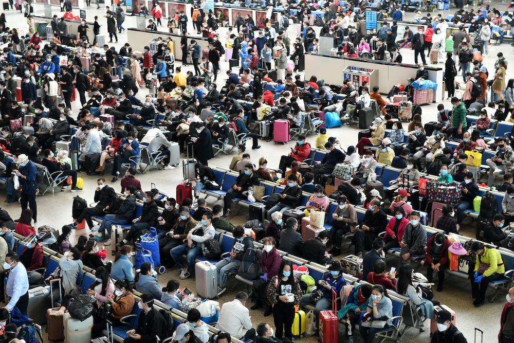 Travellers are seen inside Hankou Railway Station after travel restrictions to leave Wuhan, the capital of Hubei province and China's epicentre of the novel coronavirus disease (Covid-19) outbreak, were lifted, April 8, 2020. u00e2u20acu201d AFP picnn