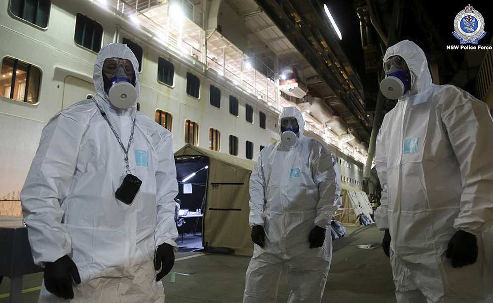 New South Wales Police Force officers about to raid the coronavirus-stricken Ruby Princess cruise ship and seize its black box at Port Kembla, Australia April 9, 2020. u00e2u20acu201d NSW Police handout via AFP
