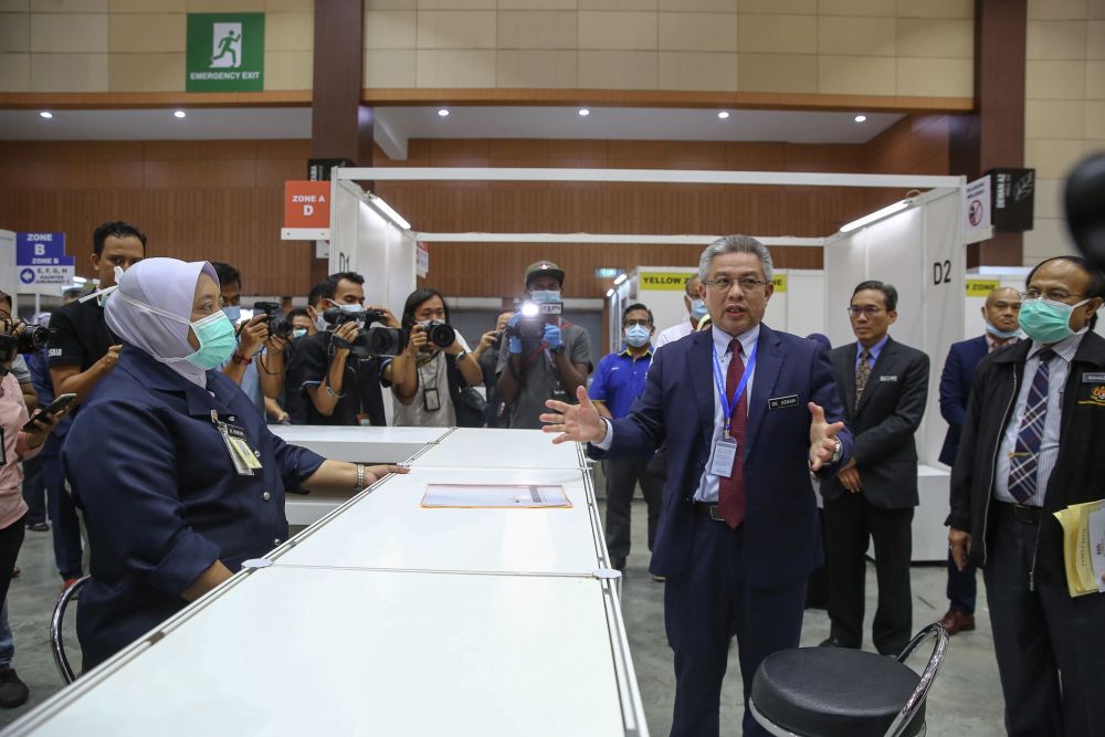 Health Minister Datuk Seri Dr Adham Baba speaks to reporters at the low-risk Covid-19 quarantine and treatment centre at the Malaysia Agro Exposition Park Serdang April 3, 2020.  — Picture by Yusof Mat Isa