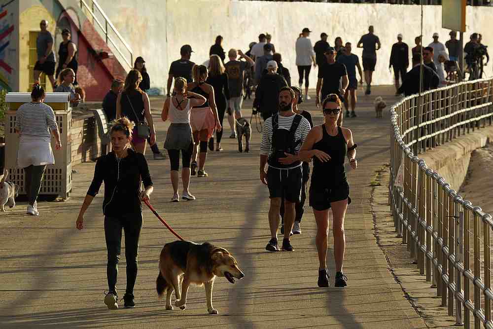 People at the walk side of Bondi Beach with strict social distancing measures remaining in place, in Sydney, Australia April 28, 2020. u00e2u20acu201d Reuters pic