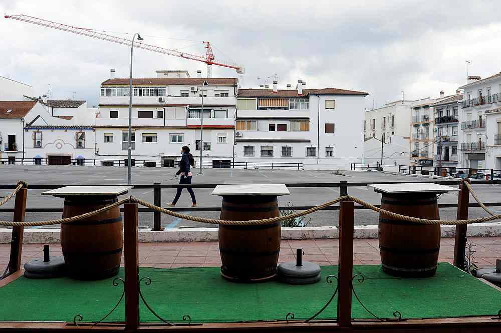A woman walks past the closed terrace of a bar during lockdown, amid the Covid-19 outbreak, in Ronda, southern Spain April 28, 2020. u00e2u20acu201d Reuters pic