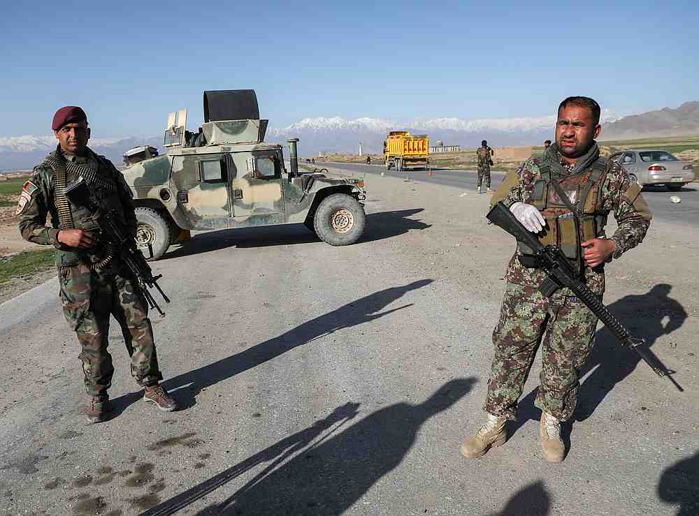 Afghan soldiers at a check point north of Kabul, Afghanistan April 2, 2020. A suicide bomber detonated a device in a Kabul district, killing three people April 28, 2020. u00e2u20acu201d Reuters pic