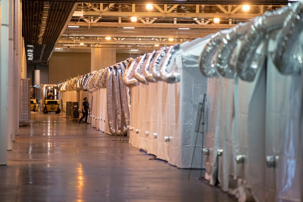 Workers inside the Ernest N. Morial Convention Center as they prepare for coronavirus disease (Covid-19) patients in New Orleans, Louisiana, US, April 5, 2020. u00e2u20acu201d Reuters pic
