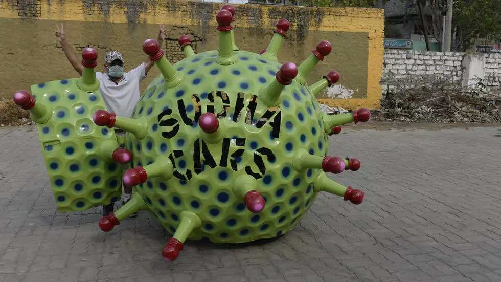 Inventor Sudhakar Yadav has been taking his coronavirus-themed car for a spin in Hyderabad to remind fellow citizens of the dangers of Covid-19. u00e2u20acu201d AFP pic