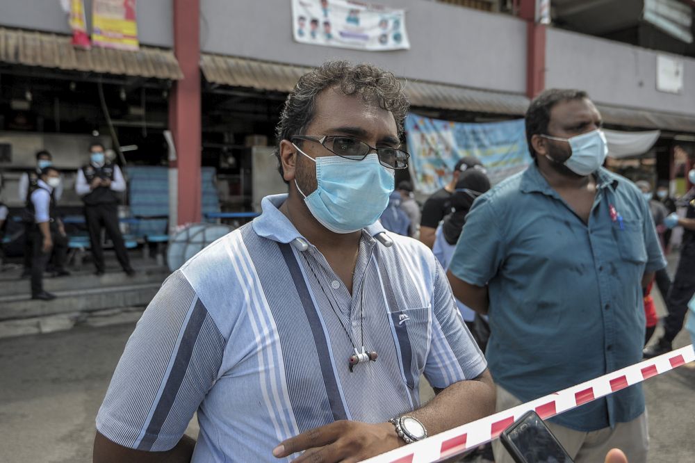 Satiya Seelan, secretary of the Jalan Othman wet market traders association, speaks to reporters in Petaling Jaya April 27, 2020. — Picture by Shafwan Zaidon