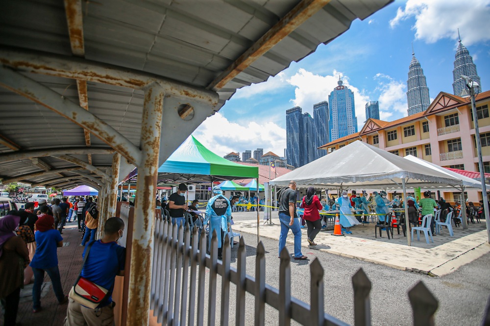 People are seen queuing up to take the Covid-19 test at Kg Baru in Kuala Lumpur April 11, 2020. u00e2u20acu2022 Picture by Hari Anggara