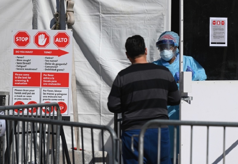 A medical worker walks out of a coronavirus, Covid-19, testing tent at Brooklyn Hospital Center in New York City. u00e2u20acu2022 AFP pic