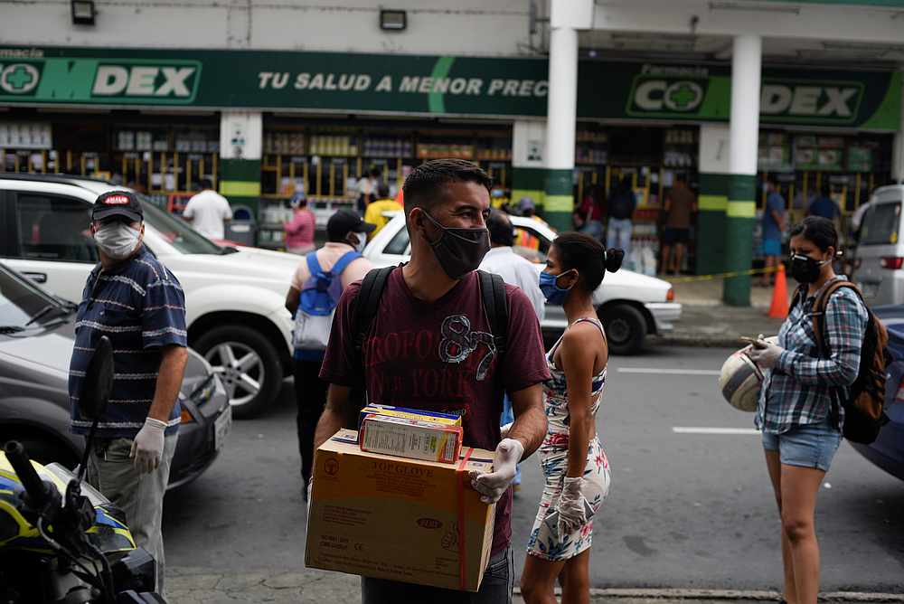 People line up outside of a pharmacy amid the outbreak of Covid-19, in Guayaquil, Ecaudor April 15, 2020. u00e2u20acu201d Reuters pic