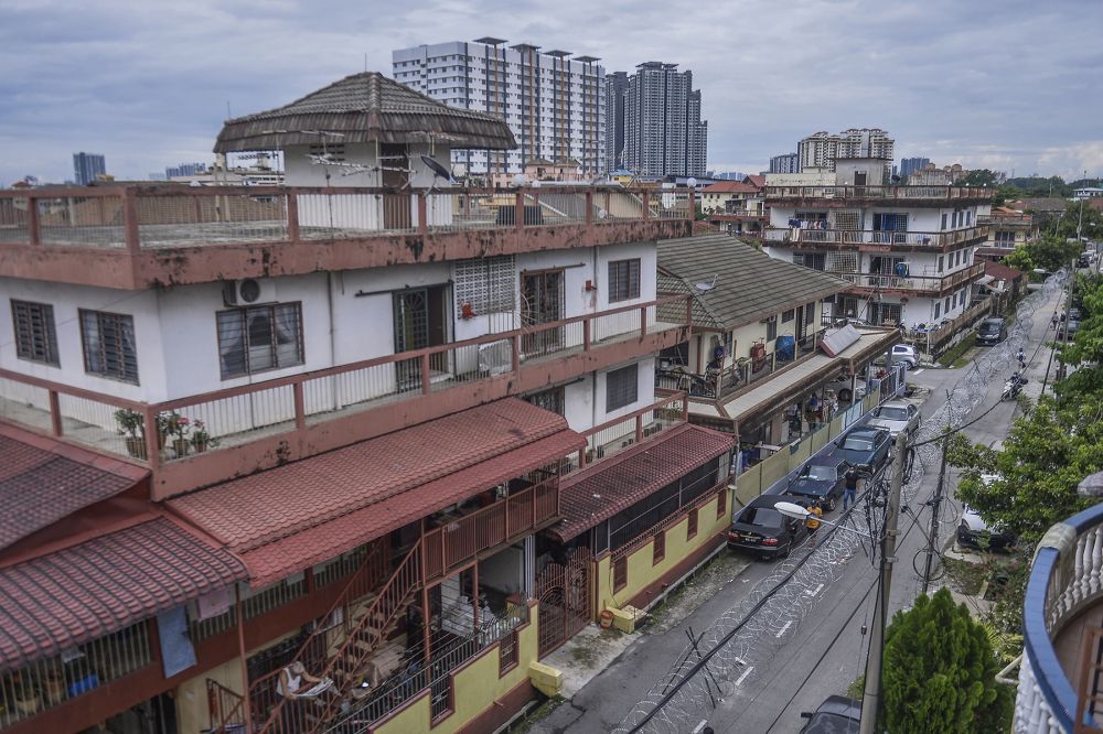 The vicinity of Selayang Baru is surrounded by barbed wire fencing during the enhanced movement control order April 26, 2020. u00e2u20acu2022 Picture by Mera Zulyana