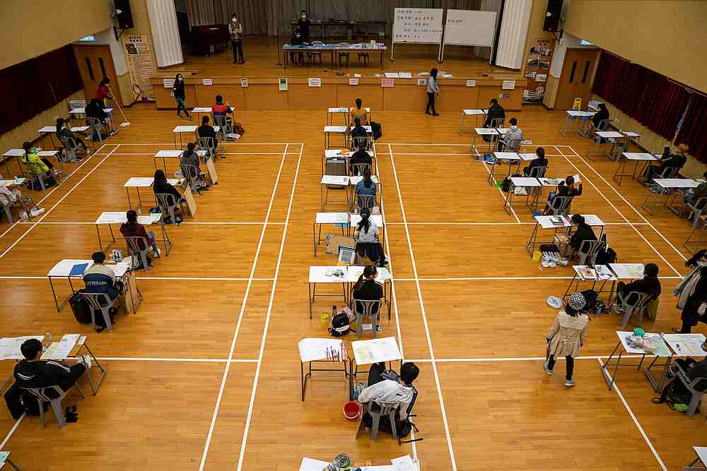 Students take the Diploma of Secondary Education (DSE) exams, following the Covid-19 outbreak, in Hong Kong 24 April 2020. u00e2u20acu201d Jerome Favre/Pool pic via Reuters