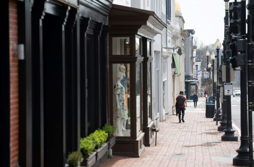 The normally bustling Georgetown neighbourhood in Washington DC has turned into a ghost town as damage to the US economy builds. u00e2u20acu201d AFP pic