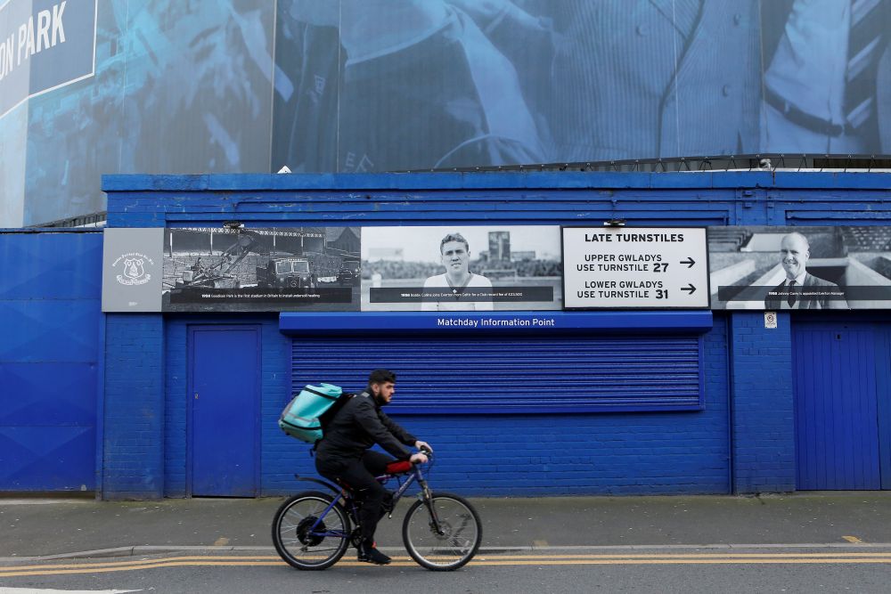 A man cycles by Goodison Park in Liverpool as the Premier League is suspended due to the number of coronavirus cases growing around the world March 16, 2020. u00e2u20acu201d Reuters pic