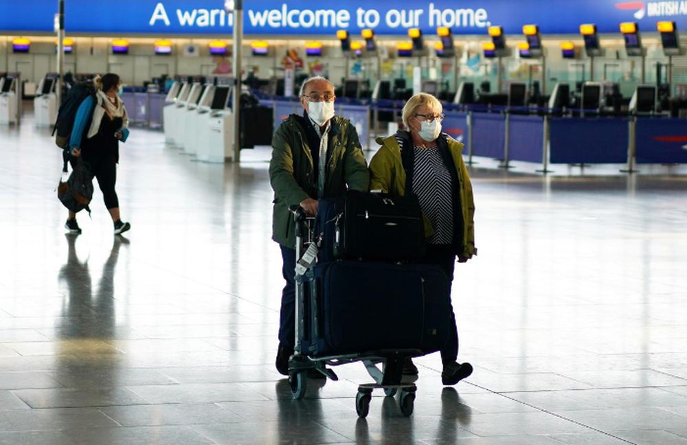 People wearing masks are seen at Heathrow airport, as the spread of the coronavirus disease (Covid-19) continues, London, Britain, April 5, 2020. u00e2u20acu201d Reuters pic