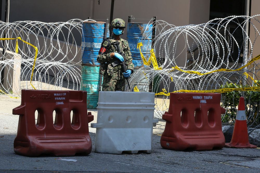 An Armed Force personnel stands guard on Jalan Masjid India in Kuala Lumpur April 16, 2020. — Picture by Yusof Mat Isa
