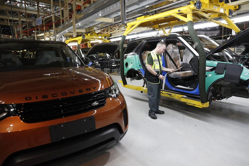 Worker George Baker looks at a build card for a vehicle destined for China at the Jaguar Land Rover facility in Solihull, Britain, January 30, 2017. u00e2u20acu201d Reuters pic