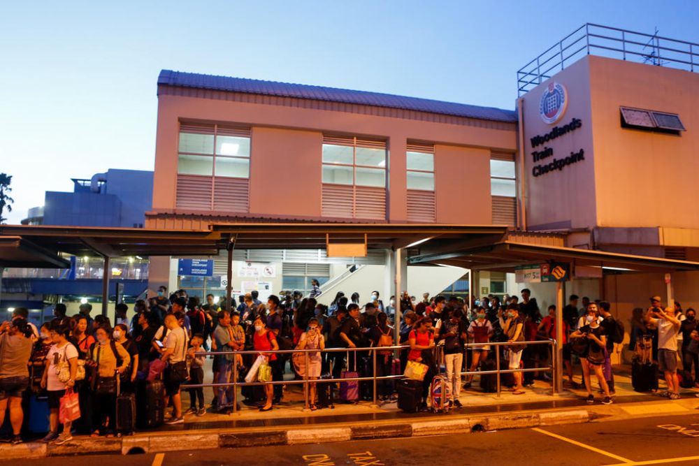 Some Malaysian work permit holders who usually commute across the border daily told TODAY they had to scramble again to find cheaper temporary accommodation as their employers had stopped supporting them. u00e2u20acu201d TODAY pic