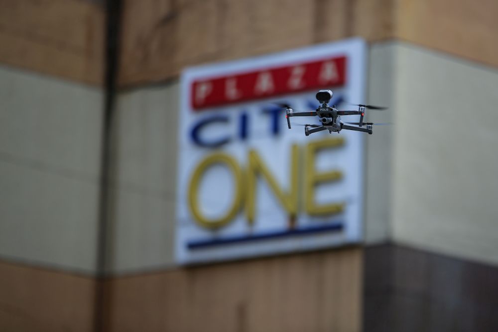 Police use a drone to monitor the enhanced movement control order imposed on Menara City One, Kuala Lumpur April 15, 2020. ― Picture by Hari Anggara 
